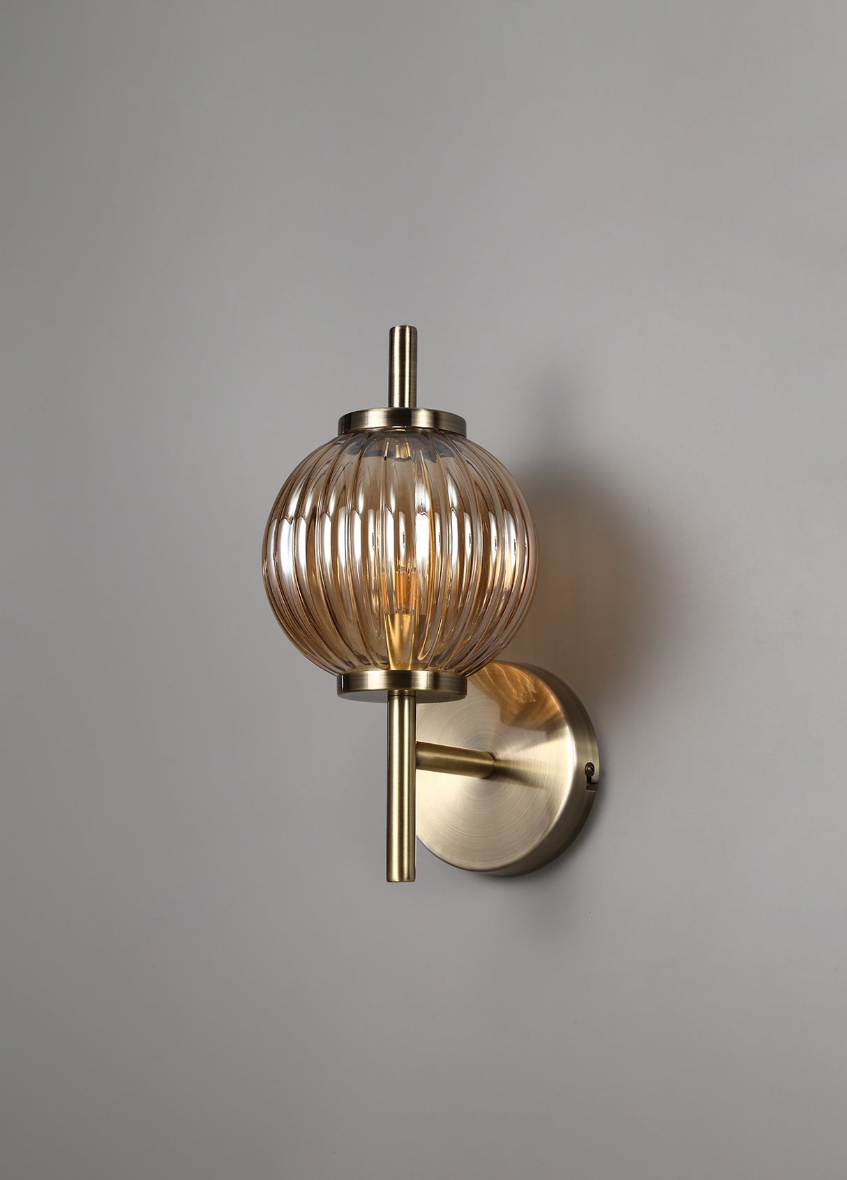 FRA4447 Franz Wall Lamp 1 Light in a Antique Brass/Amber Finish