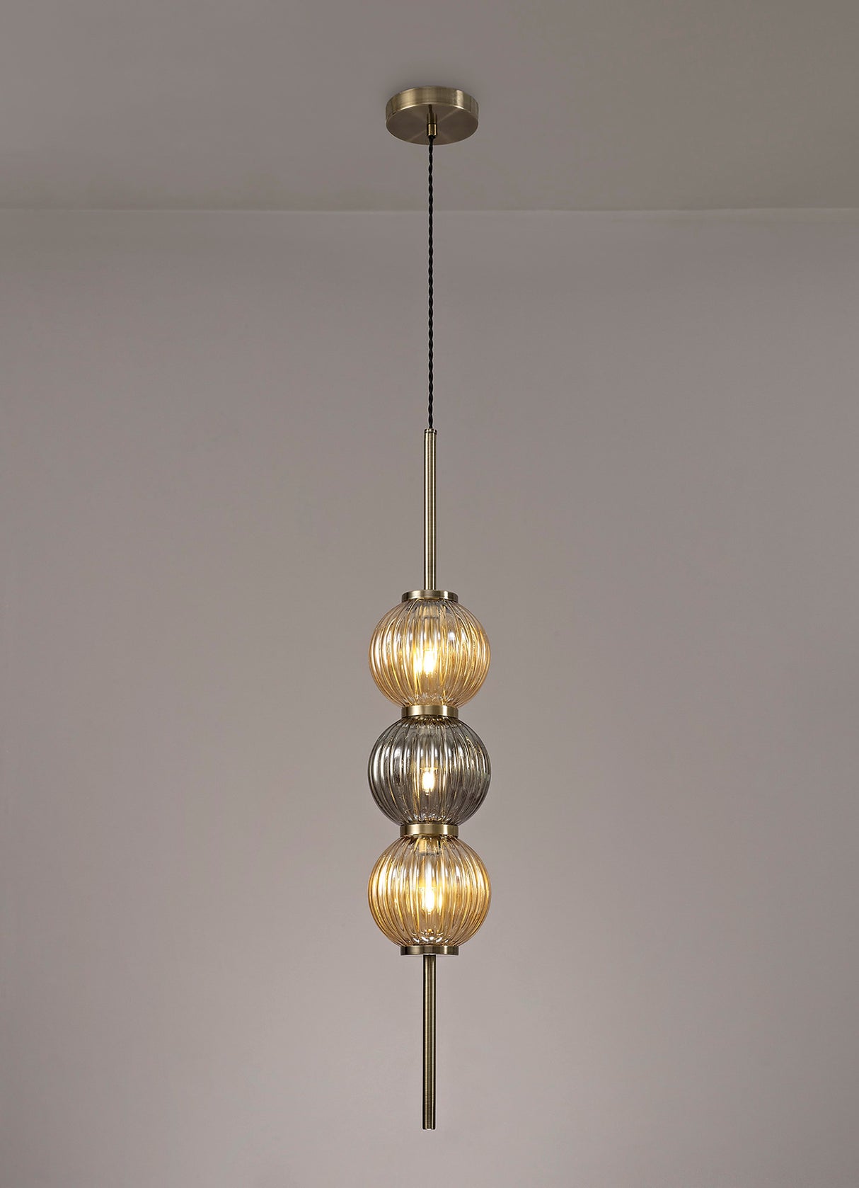 FRA5447 Franz Pendant 3 Light in a Antique Brass/Smoked/Amber Finish