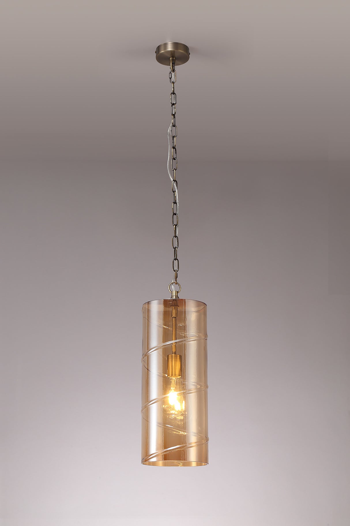 LUD9657 Ludo Pendant 1 LIght in a Antique Brass/Amber Finish