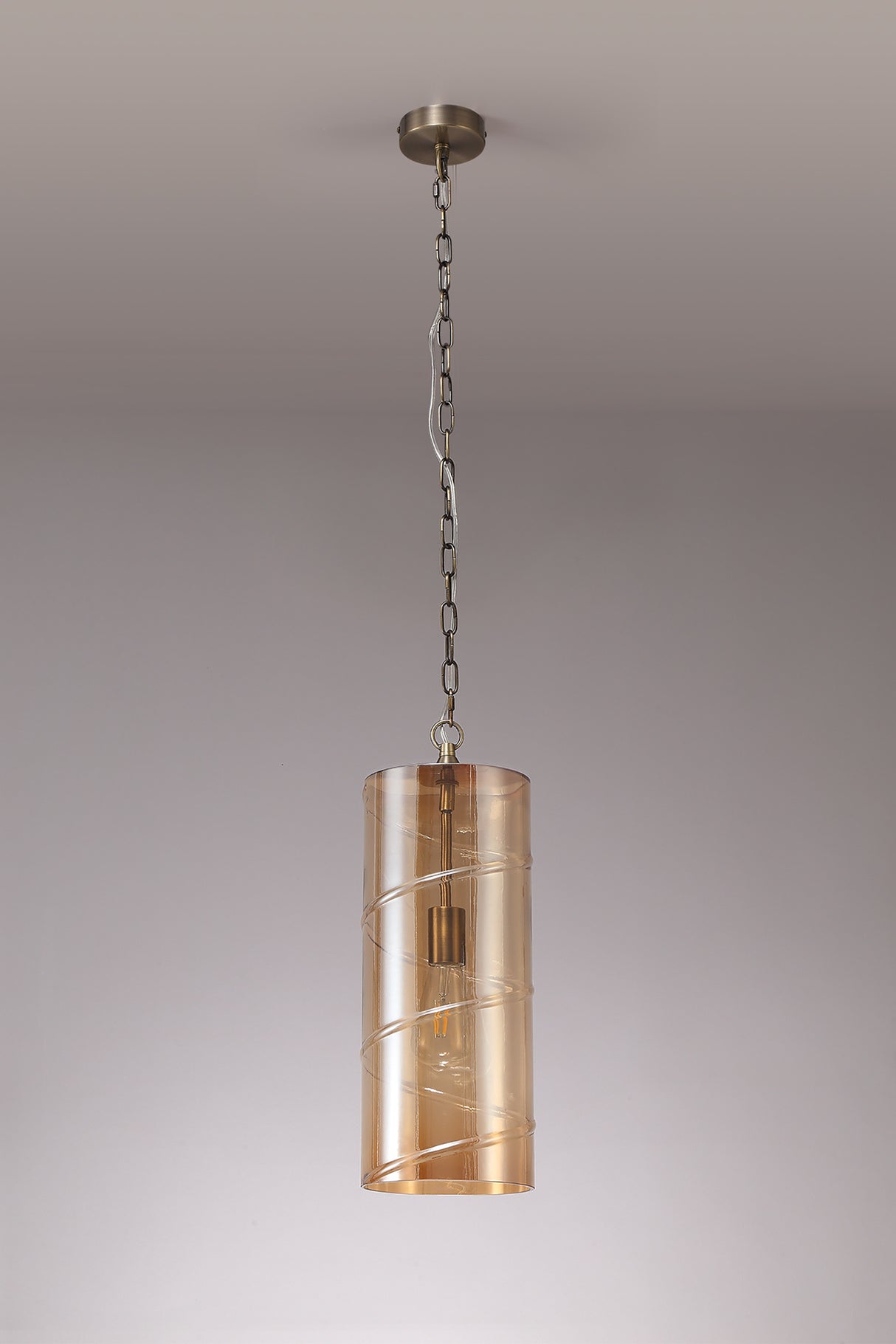 LUD9657 Ludo Pendant 1 LIght in a Antique Brass/Amber Finish